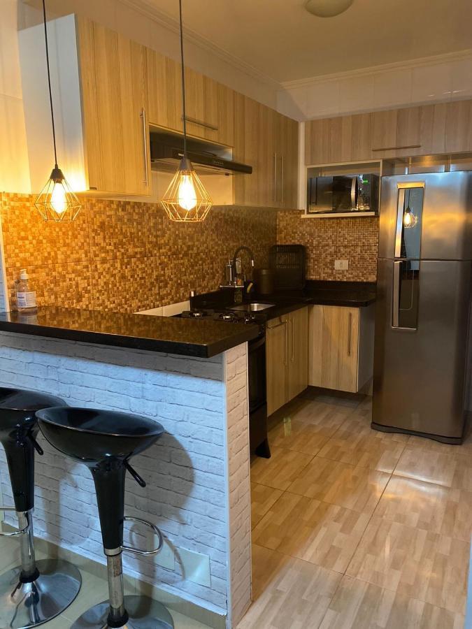 Apartamento Proximo A Praia Da Enseada Гуаружа Экстерьер фото